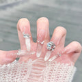 1Artificial nails with glitter and crystal embellishments Miroken