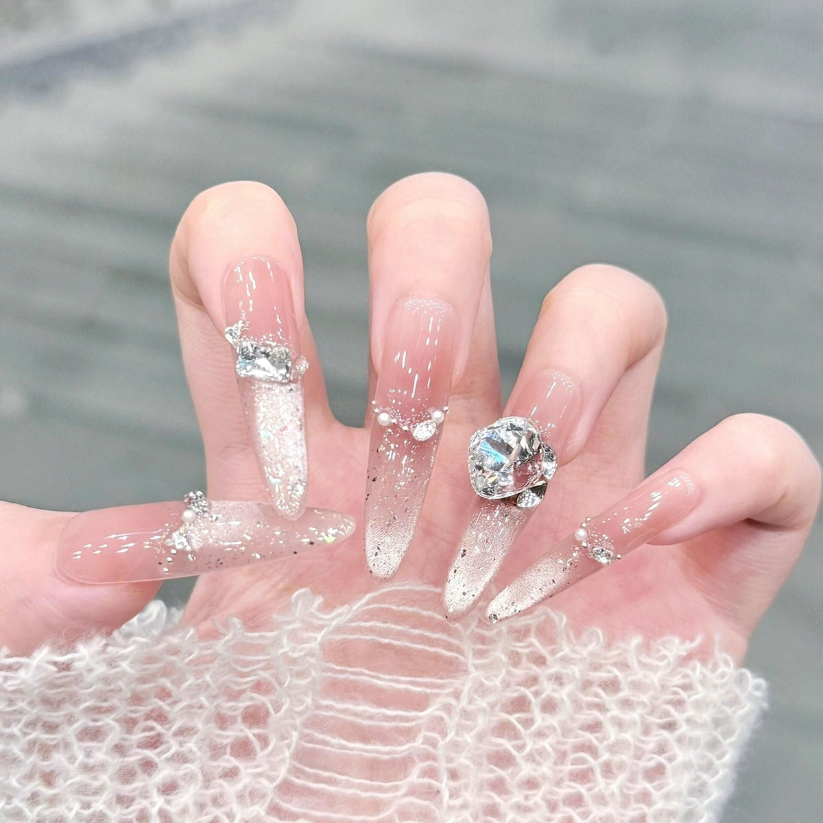 1Artificial nails with glitter and crystal embellishments Miroken