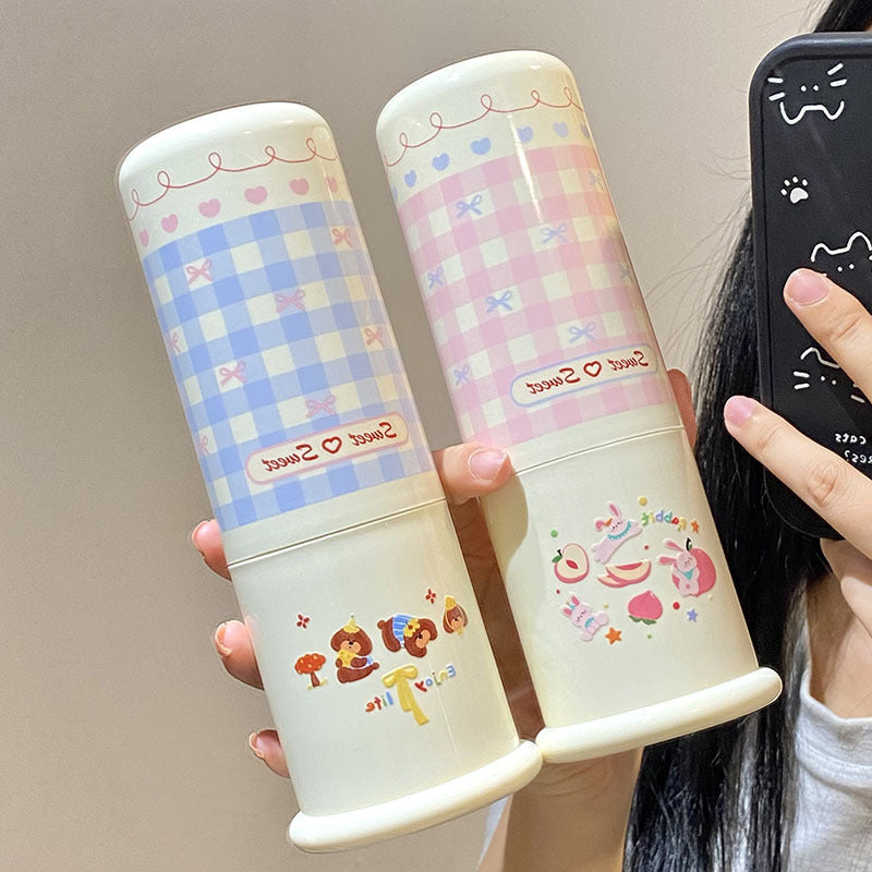 1Stylish toothbrush holder with playful checkered pattern Miroken
