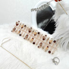 1Creative acrylic nails with animal motifs and glitter accents Miroken
