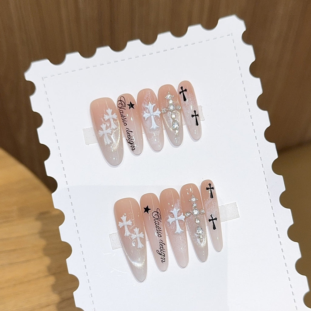 1Artificial nail tips with cross and glitter motifs Miroken
