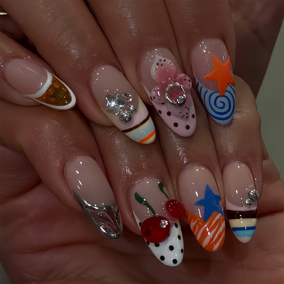 1Artificial nails with creative design and sparkling accents Miroken