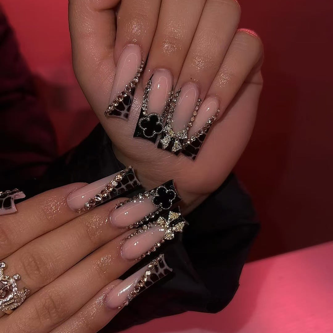 1Glamorous artificial nails with elegant design with rhinestones and 3D decorations Miroken