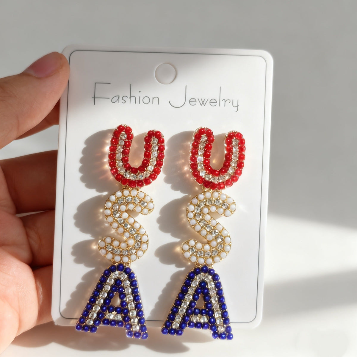 1Women’s sparkling statement earrings with crystal beads and gold-plated setting Miroken