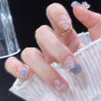 1Artistic nail decoration with glitter and butterfly details Miroken