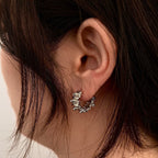 1Stylish studs in modern ribbed design Miroken