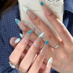 1Artistic Press-On Nail Design with Decorative Silver Accents Miroken