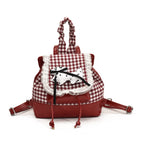 1Playful backpack with checkered pattern and animal appliqué Miroken