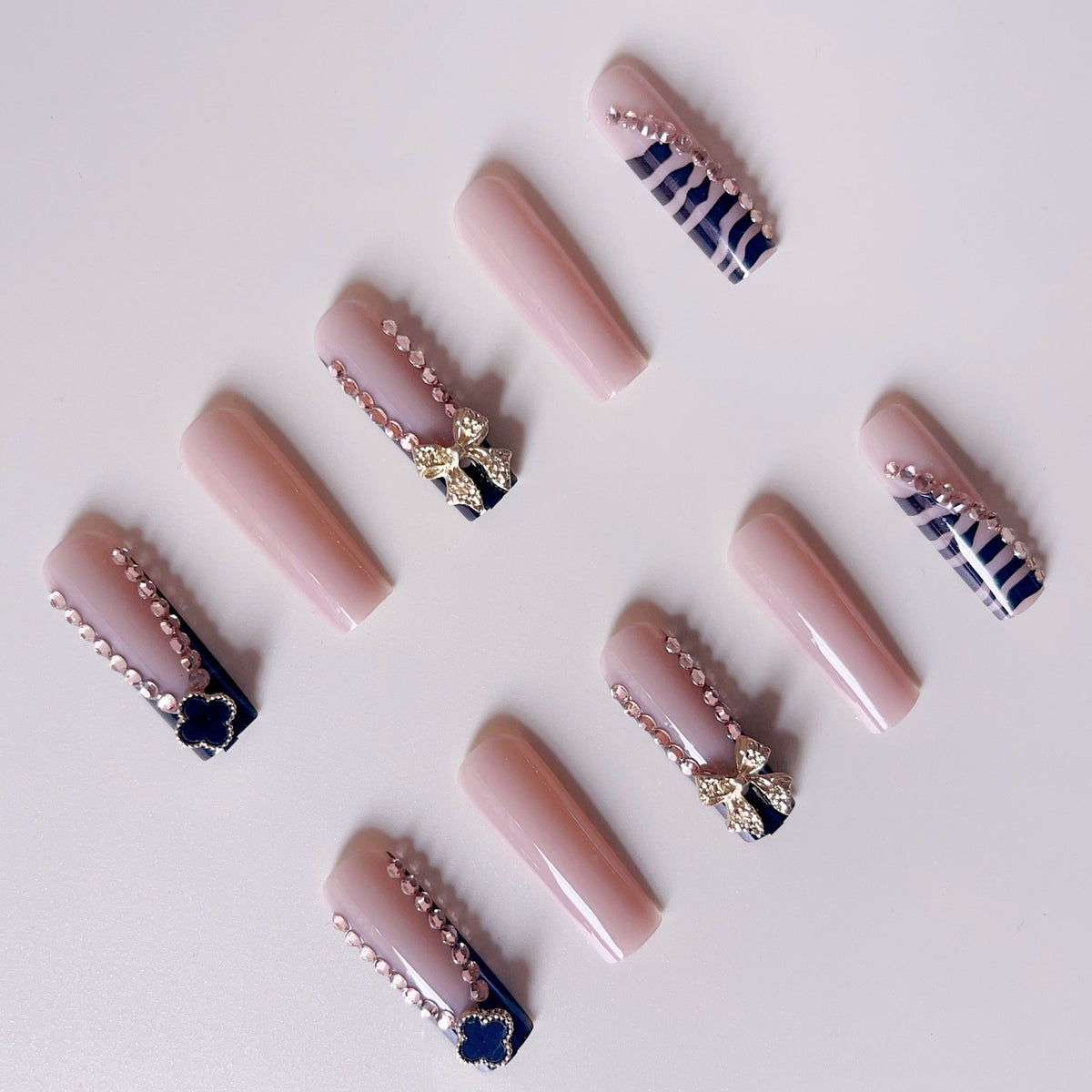 1Glamorous artificial nails with elegant design with rhinestones and 3D decorations Miroken