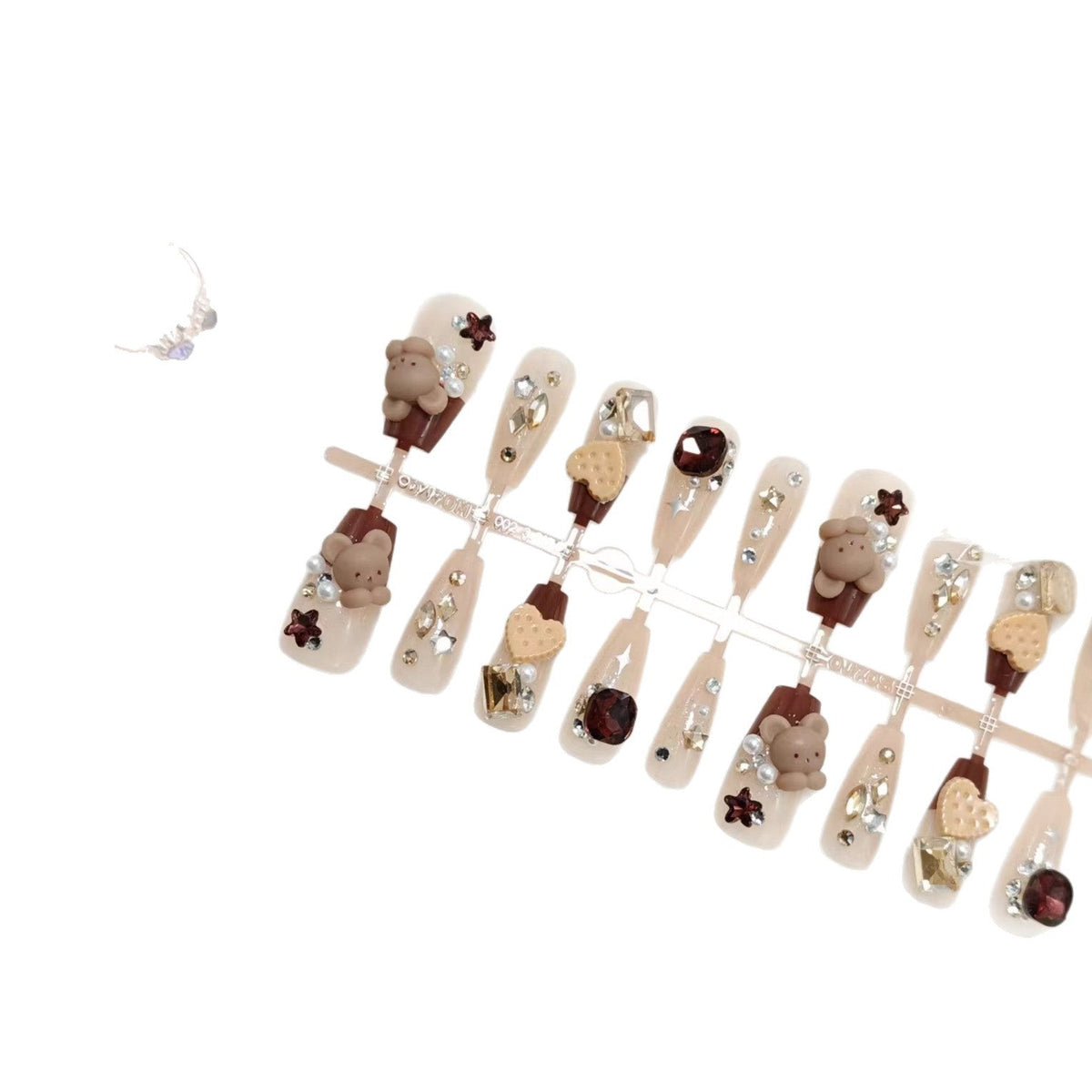 1Creative acrylic nails with animal motifs and glitter accents Miroken