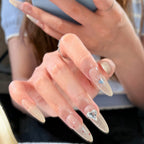 1Artistic Press-On Nail Design with Decorative Silver Accents Miroken