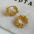 1Stylish studs in modern ribbed design Miroken