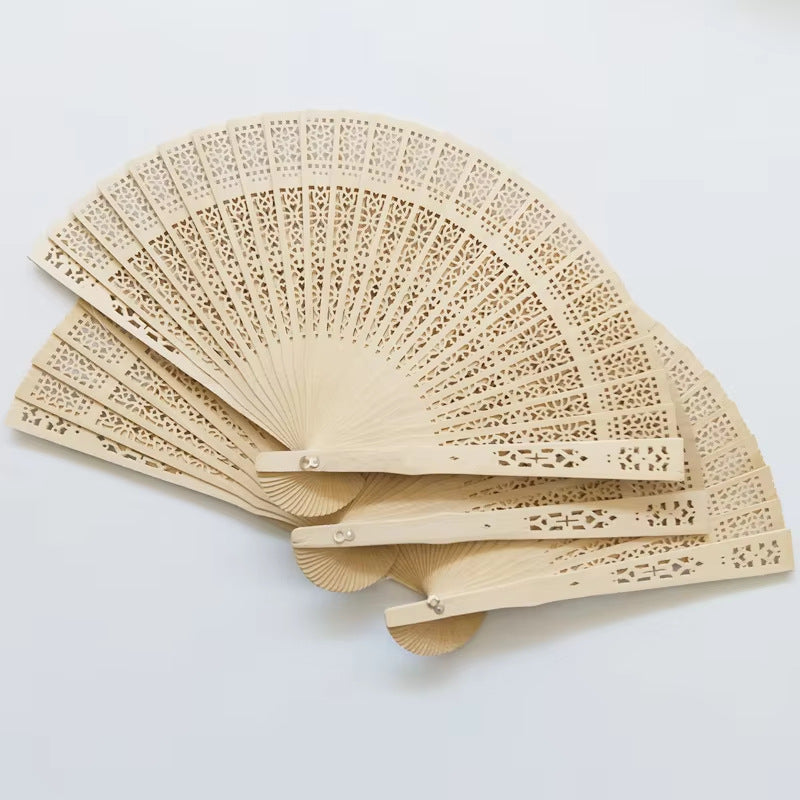 1Ladies fan made of delicate plastic with artistic cut pattern Miroken