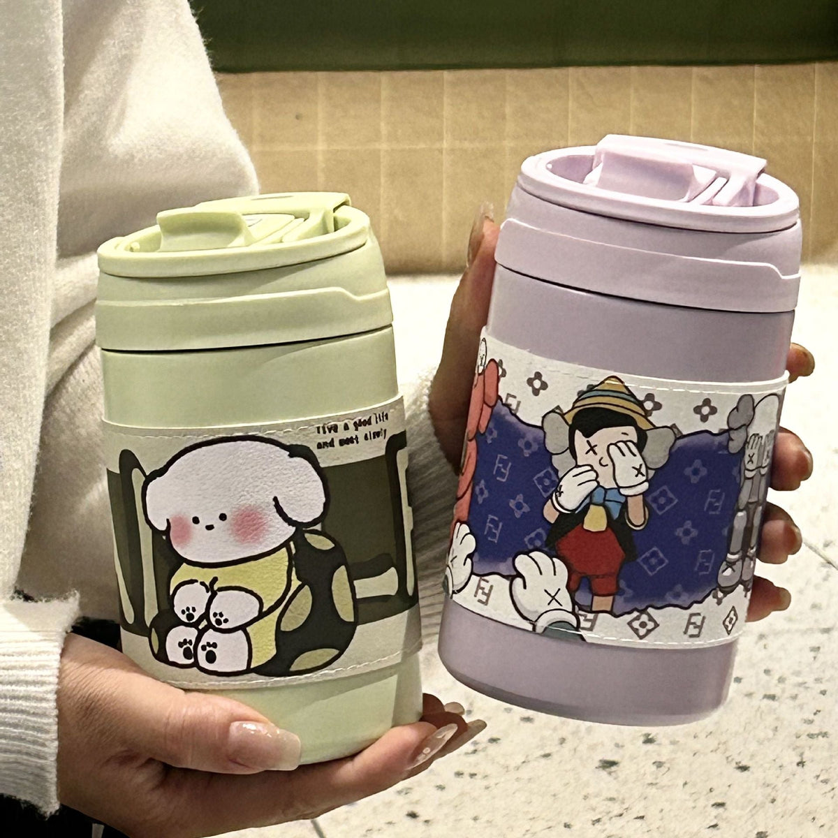 1Ladies' insulated bottle with secure flip closure and charming animal motif Miroken