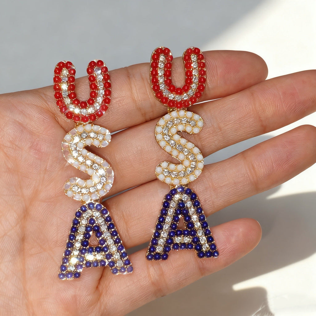 1Women’s sparkling statement earrings with crystal beads and gold-plated setting Miroken