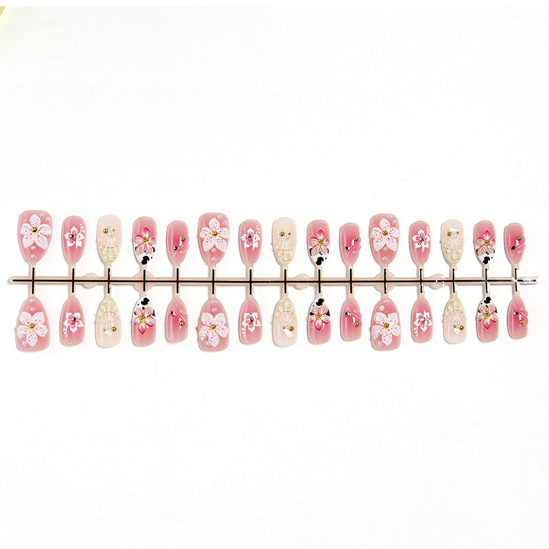 1Luxurious artificial nails with floral decorations Miroken