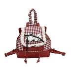 1Playful backpack with checkered pattern and animal appliqué Miroken