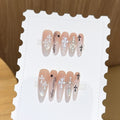 1Artificial nail tips with cross and glitter motifs Miroken