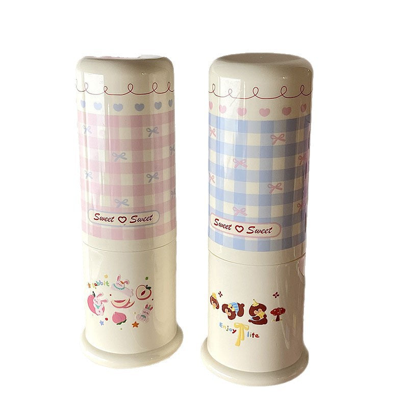 1Stylish toothbrush holder with playful checkered pattern Miroken