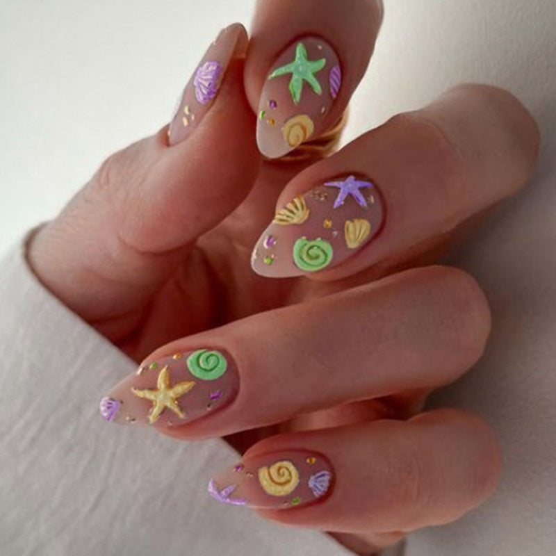 1Artistic Press-On Nail Design with Ocean-Inspired Accents Miroken