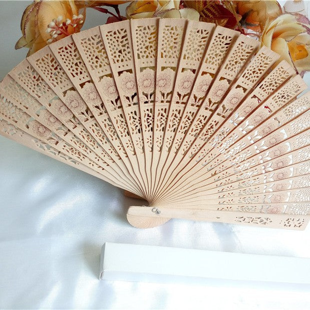 1Ladies fan made of delicate plastic with artistic cut pattern Miroken