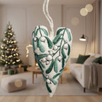DIY embroidery set for heart-shaped Christmas decorations with fabric, thread, and needles