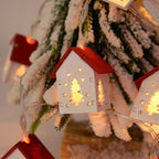 Wooden Christmas houses with LED lighting for festive decoration