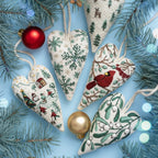 DIY embroidery set for heart-shaped Christmas decorations with fabric, thread, and needles