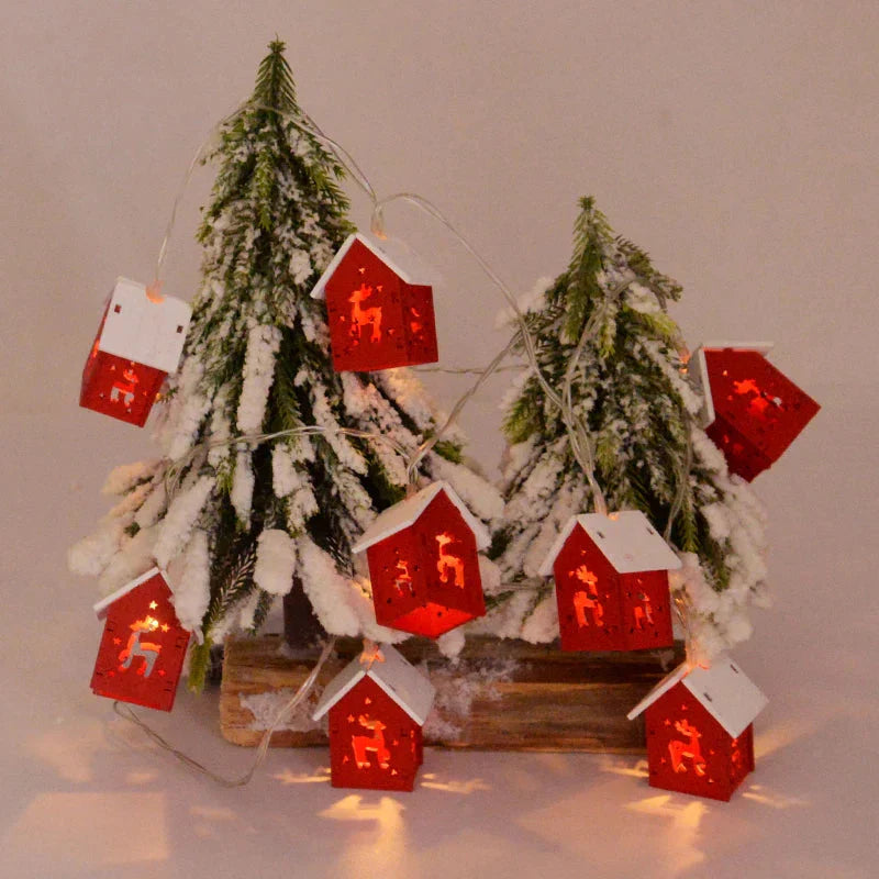 Wooden Christmas houses with LED lighting for festive decoration