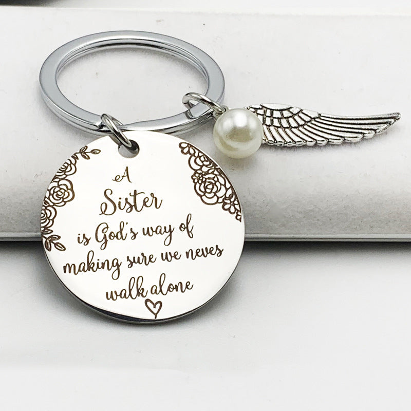 A sister is God's way of making sure we never walk alone keychain