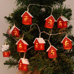 Wooden Christmas houses with LED lighting for festive decoration